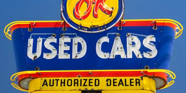 How does a car dealer make $6000 on the sale of a used car?